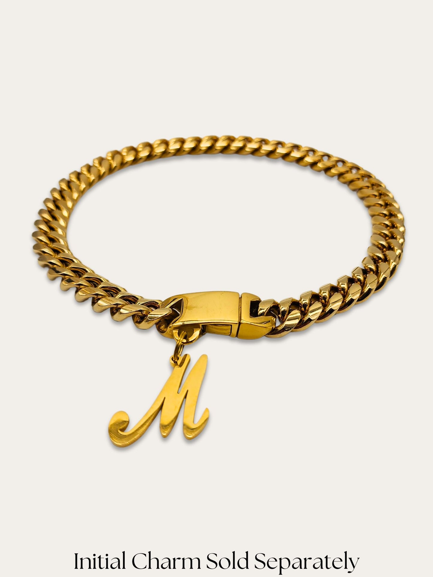 Gold Cuban Link dog necklace adorned with an Initial Charm Letter M by Jax & Molly's.