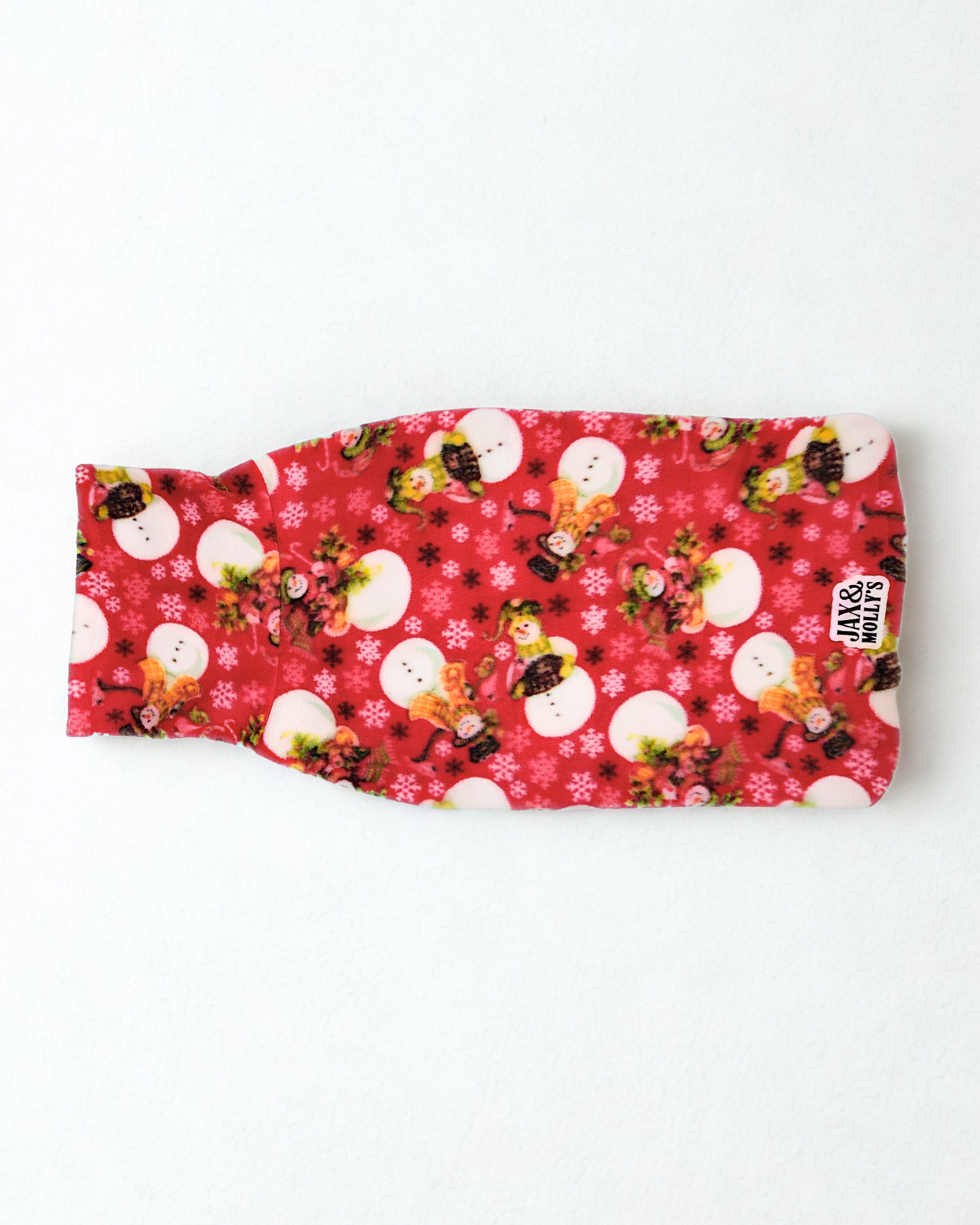Cozy red snowman dog sweater flat lay – handmade fleece pullover