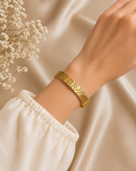 hammered gold cuff bracelet worn on wrist open bangle everyday jewelry styling