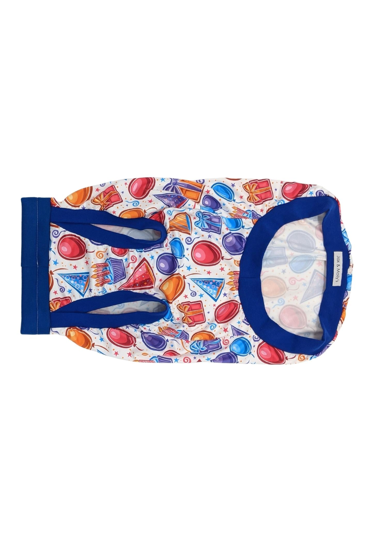 Jax & Molly's birthday dog pajamas with a balloon and cake print