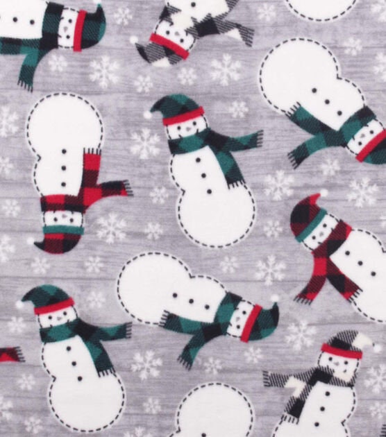 Grey fleece fabric with winter snowflakes and snowman scarf print