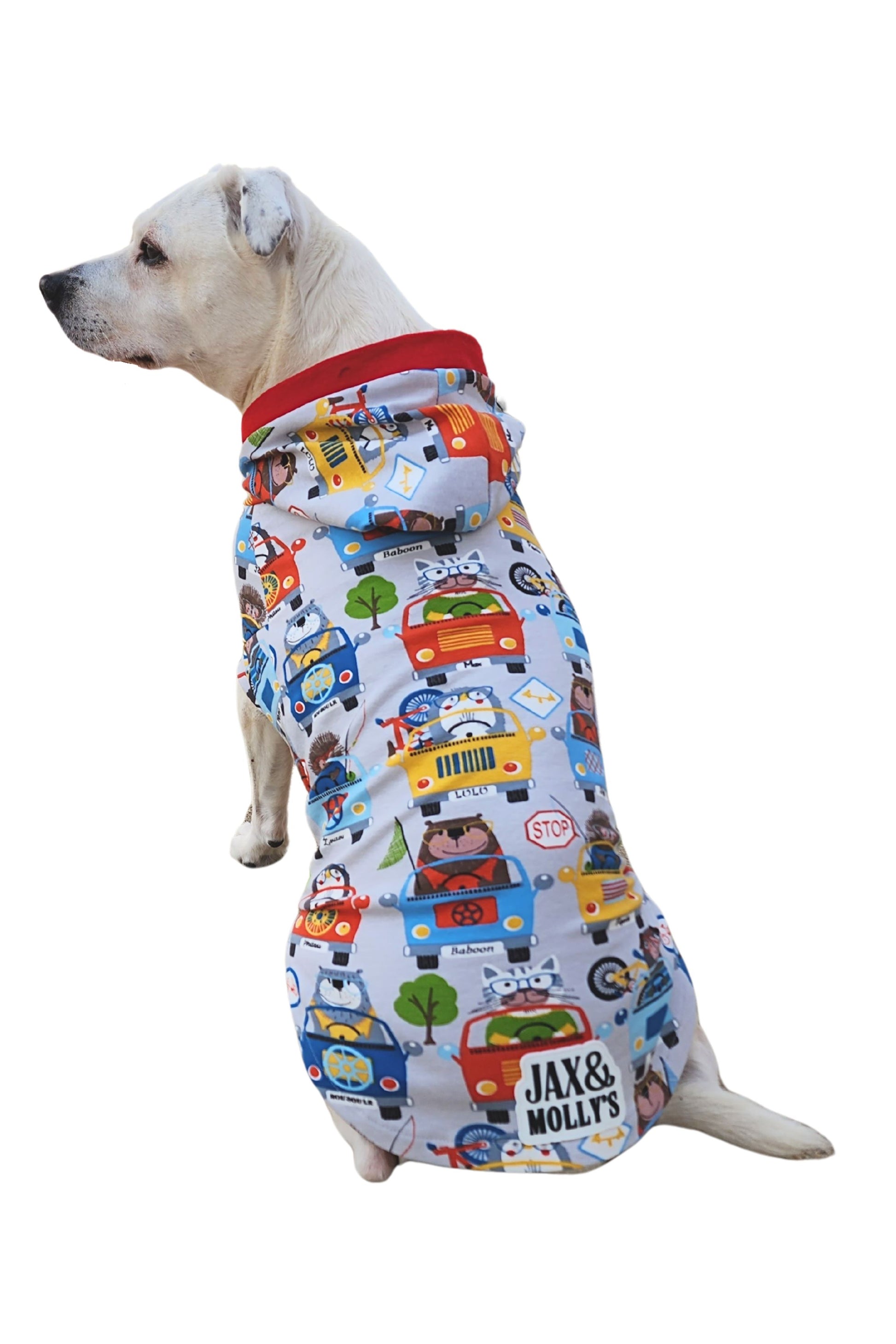 Back view of medium white dog in animal road trip hooded dog pajamas, displaying full print and hood placement