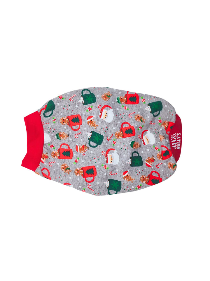 Top view of Jax & Molly's Christmas Mug Dog Pajamas with and adorable print of Christmas mugs with Santa, gingerbread cookies, candy canes, and more holiday accents complimented by the brand's logo.