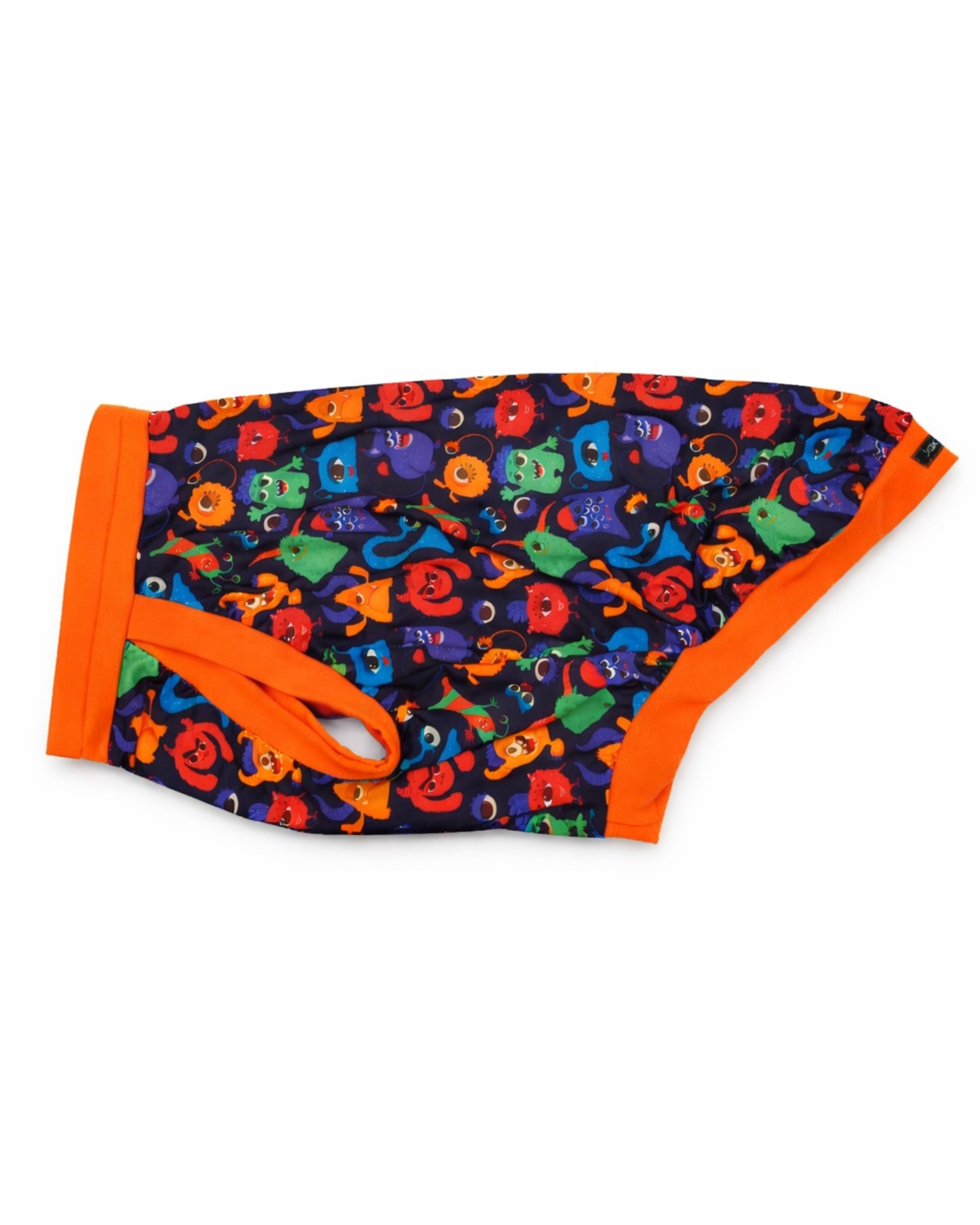 Colorful Monster Comrades dog pajamas with orange trim, side view showing bold monster pattern