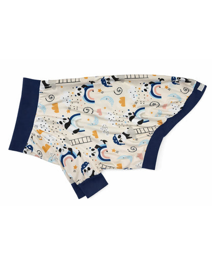 Side view of the 'Dreamy Panda' dog pajamas featuring a sleepy pandas and rainbow print featuring navy trim