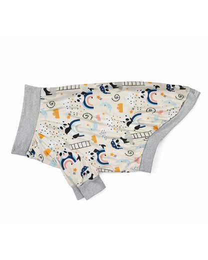 Side view of the 'Dreamy Panda' dog pajamas featuring a sleepy pandas and rainbow print featuring gray trim