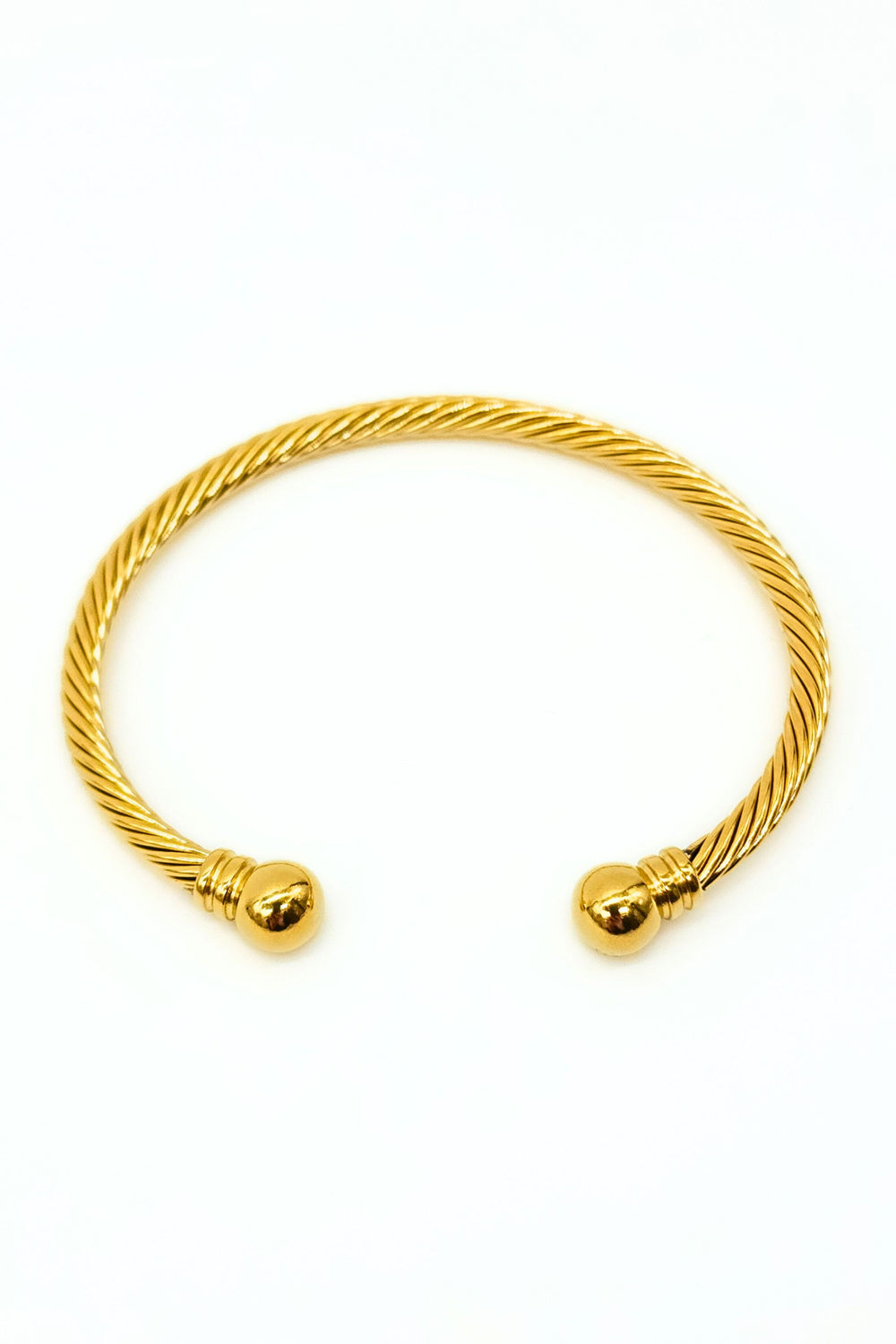 Gold rope bracelet crafted from stainless steel, adorned with gold ball ends