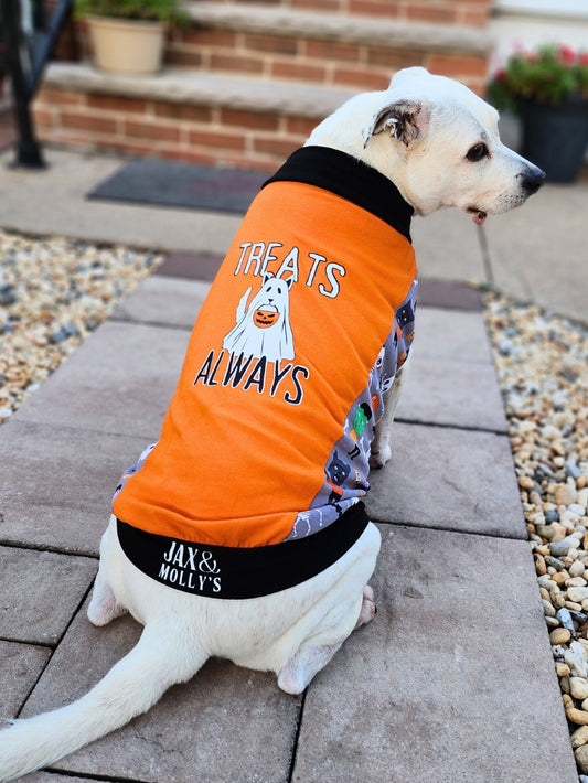 Dog wearing Halloween Treats Always muscle tank with ghost vinyl print