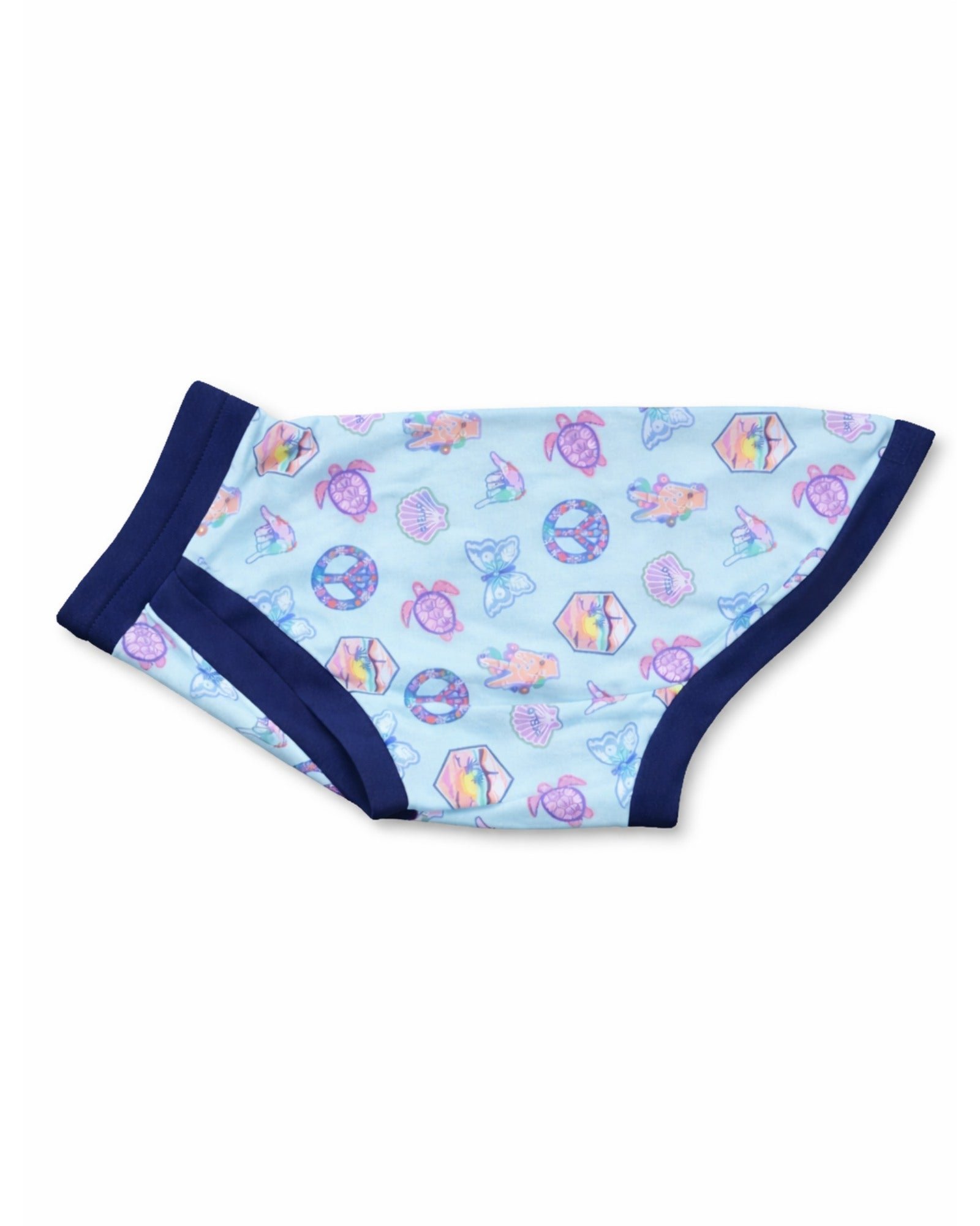 Flat lay of Peaceful Sunset dog pajamas with navy trim, cotton spandex fabric