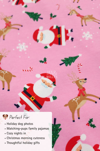 Pink fabric with Santa Claus and reindeer pattern on a pink background