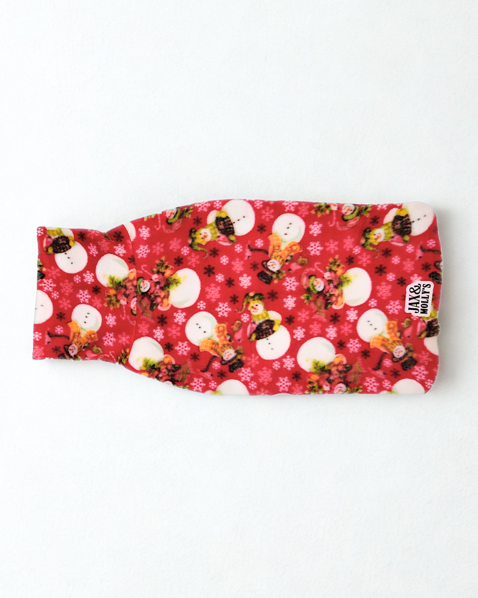 Cozy red snowman dog sweater flat lay – handmade fleece pullover