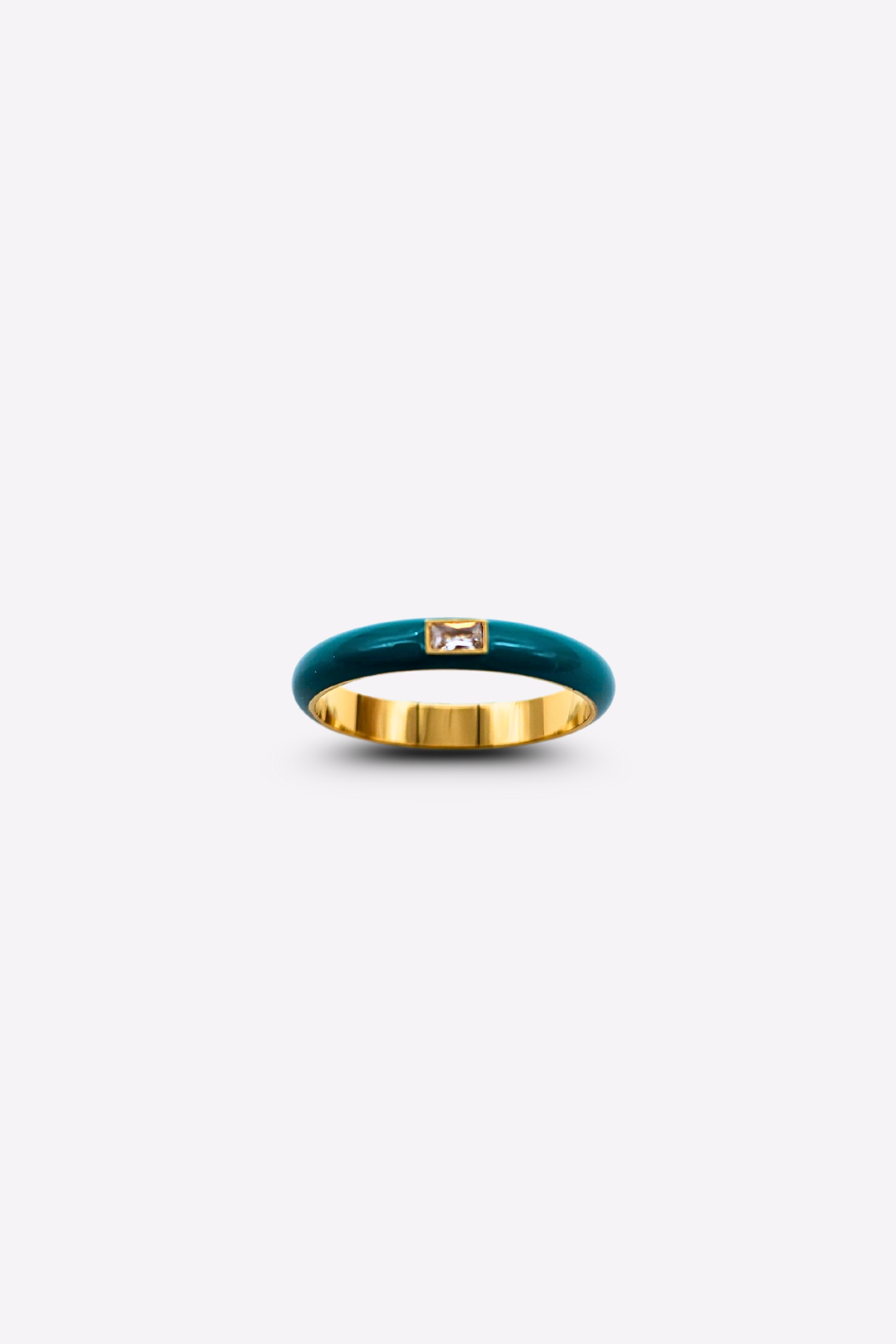 Close-up of the Elegant Teal Enamel Gemstone Ring on a white background, highlighting the vivid teal enamel band and the glimmering rectangular gemstone.