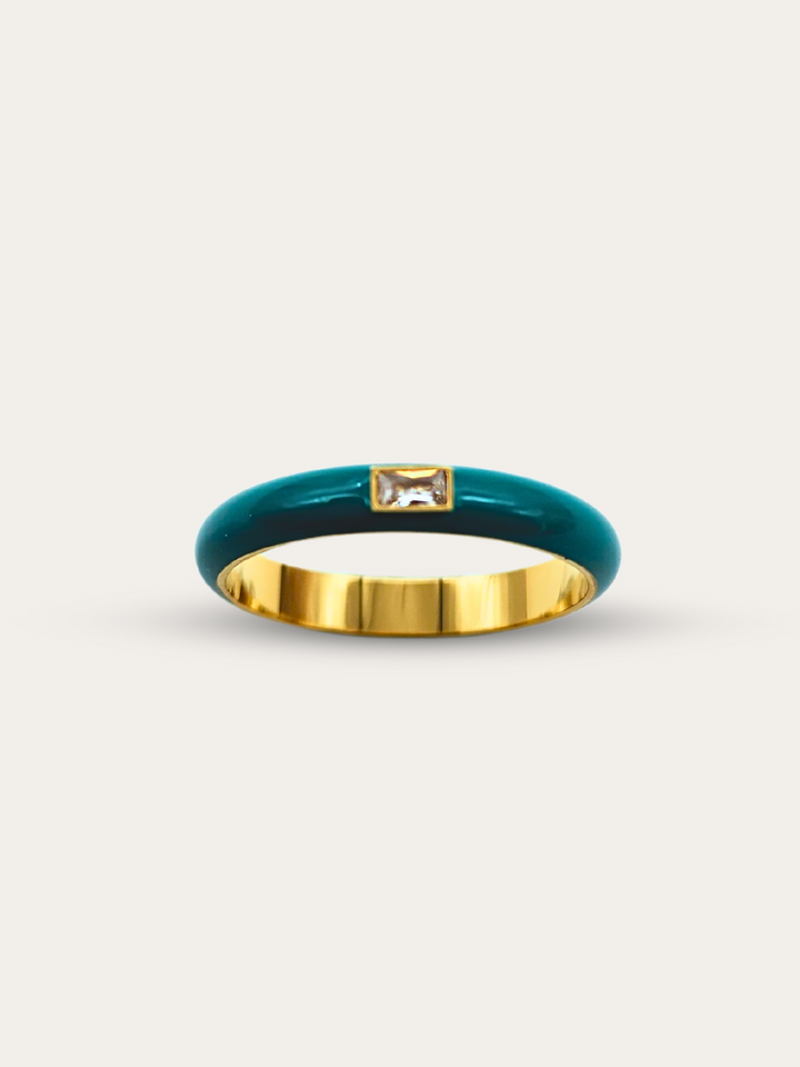 Close-up of the Elegant Teal Enamel Gemstone Ring on a white background, highlighting the vivid teal enamel band and the glimmering rectangular gemstone.