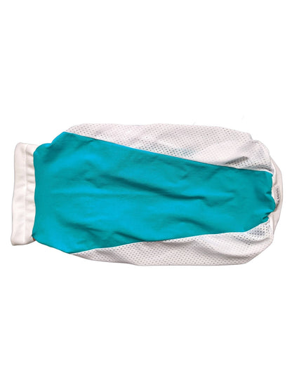 Back view of teal and white dog athletic jersey with mesh panels