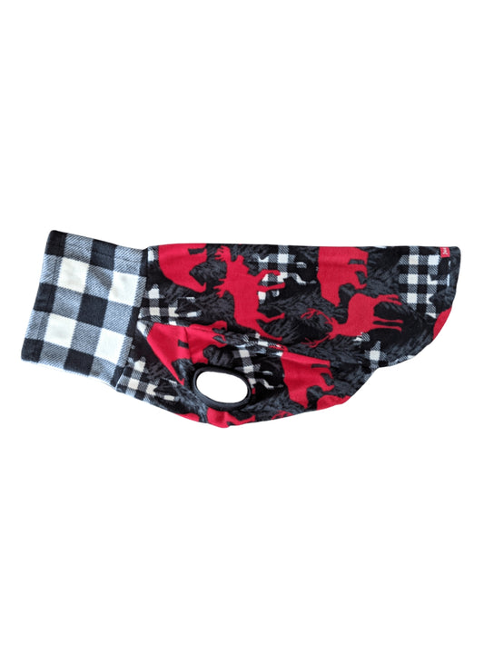 Side profile of a dog sweater with print of bears and moose in red as well as white and black buffalo plaid with a matching buffalo plaid turtleneck.
