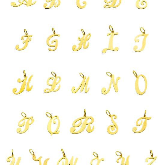 Gold initial dog charms on display
