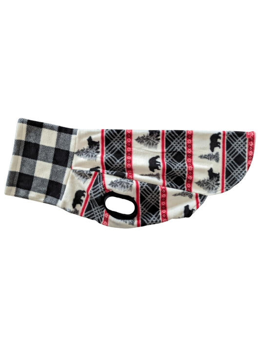 Side profile of a fleece dog sweater featuring black bears with pine trees and red accents with a black and white buffalo plaid turtleneck.