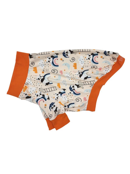 A dog pajama with sleepy pandas and rainbow print on a light background, featuring orange trim with matching waistband