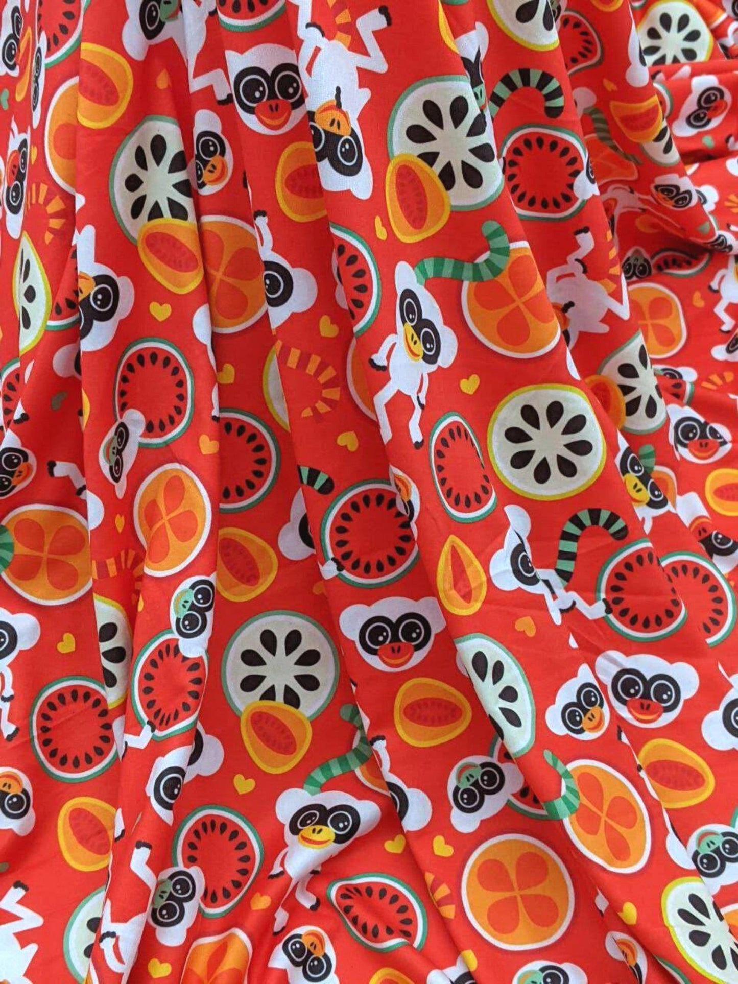 Lightweight pajama fabric with an adorable lemur and fruit design used for dog pajamas
