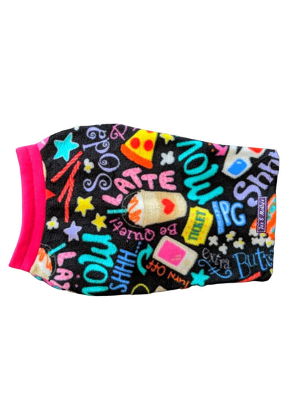 Back view of a black dog sweater adorned with a movie-themed print, highlighted by Fuchsia trim on the neck.