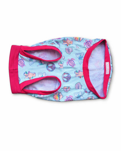 Underbelly view of Peaceful Sunset dog pajamas with fuchsia trim on white background