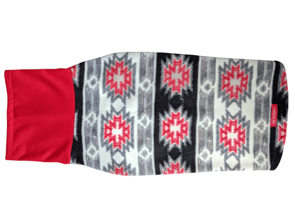 Back profile of Jax & Molly's striking Aztec fleece dog sweater in red, gray, white, and black colors and paired with a vibrant red sweatshirt turtleneck.