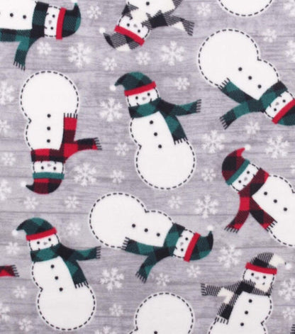 Grey fleece fabric with winter snowflakes and snowman scarf print