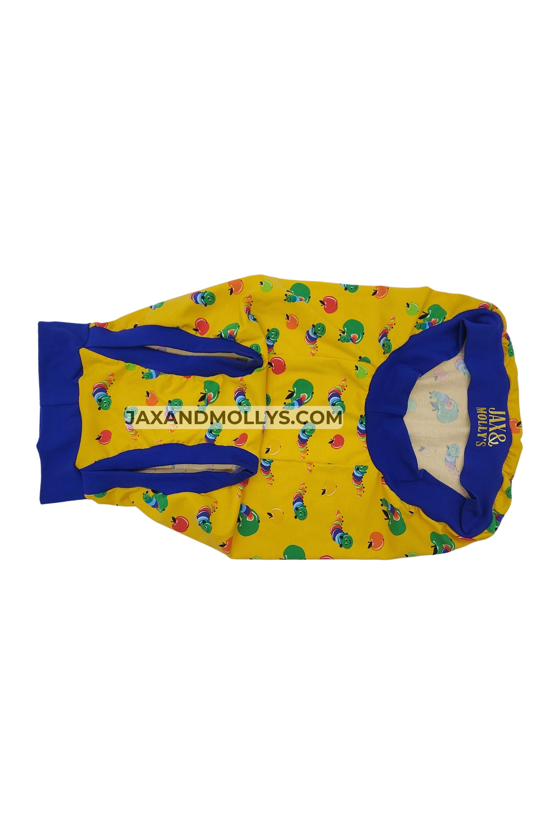 Yellow dog pajamas with a caterpillar design