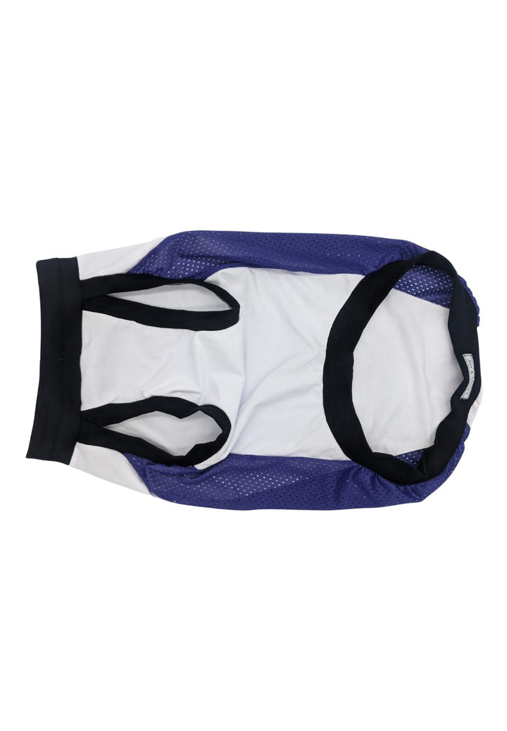 Underbelly view of the dog sports jersey with a white body, purple mesh sides, and black trim, displayed on a white background, emphasizing the larger arm holes. 

